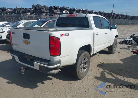 2015 Chevrolet Colorado Z71 из США, поврежденный, VIN 1GCGSCE34F1210875